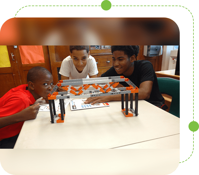 Three kids playing a game on the table.