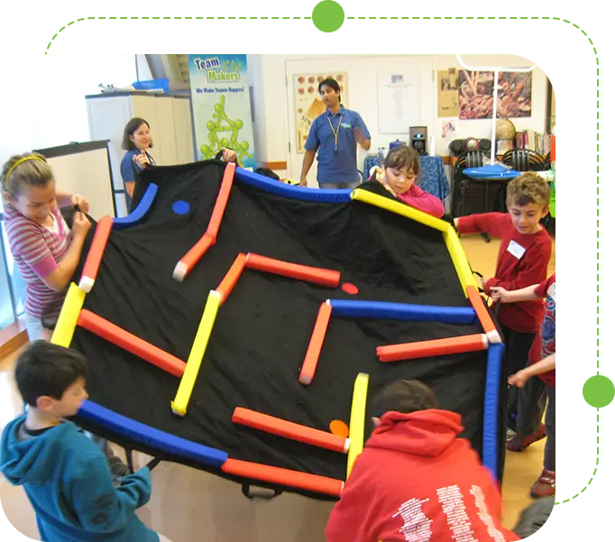 A group of kids playing with an interactive game.